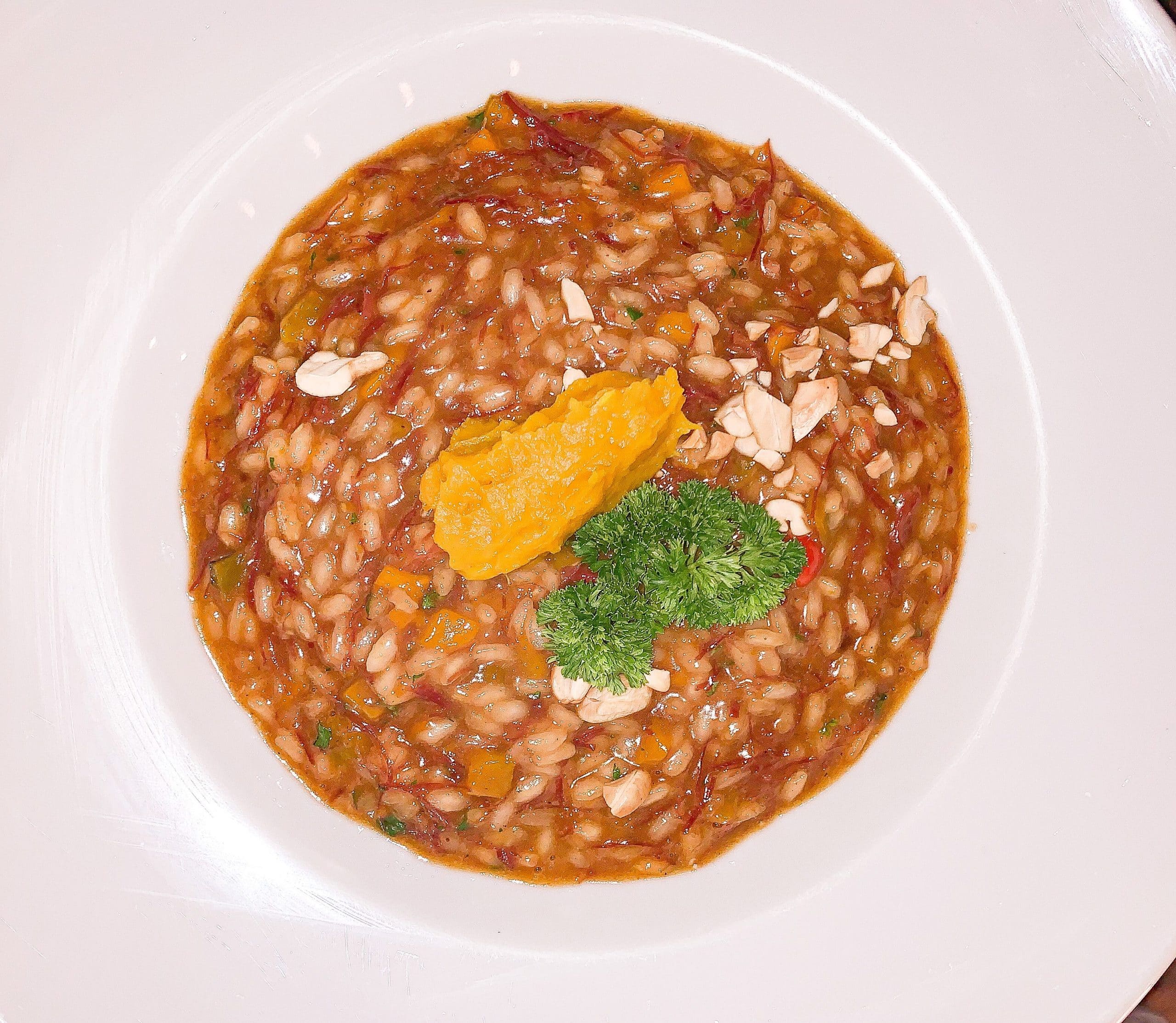 Arroz carnaroli, carne de sol, abóbora, manteiga de garrafa e castanha de caju